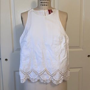 White top with lace trim hemline